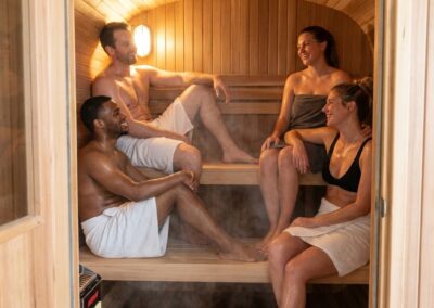 four people in a Cube Sauna